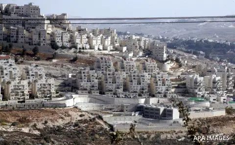A part of work in Jewish settlement of Harmoun Hanatsave near the Arab neighbourhood of Ras al-Amud in Jerusalem on Oct. 30,2012. The Israeli occupation authority's approved to construct nearly 800 new settlement units i...