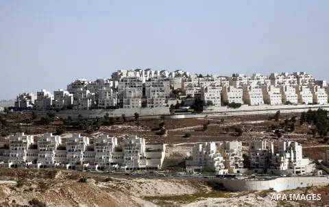 A part of work in Jewish settlement of Harmoun Hanatsave near the Arab neighbourhood of Ras al-Amud in Jerusalem on Oct. 30,2012. The Israeli occupation authority's approved to construct nearly 800 new settlement units i...