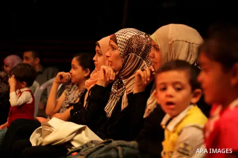 Palestinians watch members of the Egyptian National Circus as they practice in Gaza City on Oct. 30, 2012. The circus came to Gaza on Friday, accompanied by blaring music, juggling clowns and fire blowers but getting it...