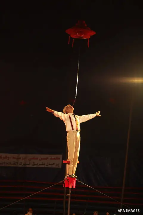A member of the Egyptian National Circus practices in Gaza City on Oct. 30, 2012. The circus came to Gaza on Friday, accompanied by blaring music, juggling clowns and fire blowers but getting it there required its own hi...
