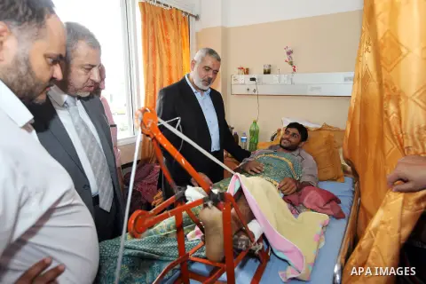 Palestinian Prime Minister in Gaza strip Ismail Haniyeh visits injured by Israeli airstrikes on Gaza strip at al-Shifa hospital in Gaza on Oct. 31, 2012. Israeli airstrikes killed many Palestinians and wounded others dur...