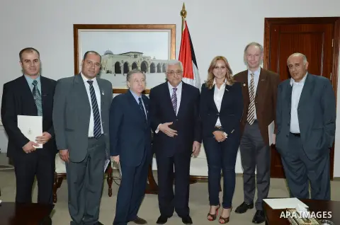 Palestinian President Mahmoud Abbas meets with the President of the Federation International Motor Sports Jean Todt at the Palestinian Authority headquarter in the West Bank city of Ramallah on Oct. 31, 2012. Photo by Th...