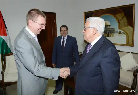 Palestinian President Mahmoud Abbas meets with the Minister of Foreign Affairs of Latvia Edgars Rinkevics at the Palestinian Authority headquarter in the West Bank city of Ramallah on Oct. 31, 2012. Photo by Thaer Ganaim