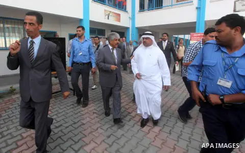 Secretary General of the Royal Charity Organization in the Kingdom of Bahrain, Mustafa al-Sayed visits a UNRWA (United Nations Relief and Works Agency) school financed by Bahrain, in Gaza City, on November 1, 2012. Photo...
