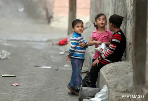 A Palestinian refugee children play outside their house in the Shati refugee camp in Gaza City on November 2, 2012. The turbulent political conditions that prevailed in Palestine after Balfour Declaration up to 1948, hav...