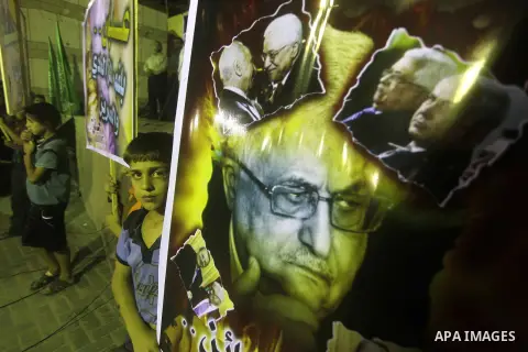 Hamas supporters attend a rally against Palestinian President Mahmoud Abbas in Jabalya in the northern Gaza Strip November 3, 2012. Abbas made a rare if symbolic concession to Israel on Thursday, saying he had no permane...