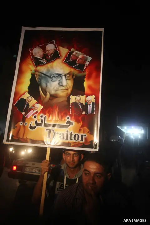 Hamas supporters attend a rally against Palestinian President Mahmoud Abbas in Jabalya in the northern Gaza Strip November 3, 2012. Abbas made a rare if symbolic concession to Israel on Thursday, saying he had no permane...