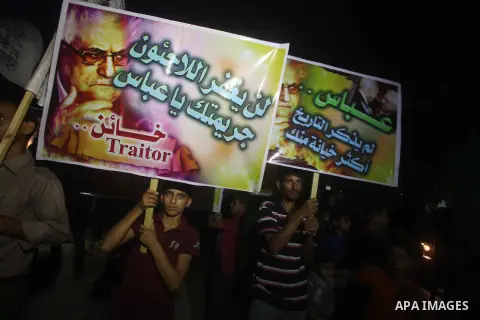 Hamas supporters attend a rally against Palestinian President Mahmoud Abbas in Jabalya in the northern Gaza Strip November 3, 2012. Abbas made a rare if symbolic concession to Israel on Thursday, saying he had no permane...