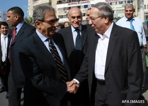 Egyptian politician and former Arab League secretary general, Amr Moussa walks around in the old town market in the west bank city of Nablus on November 4, 2012. Photo by Nedal Eshtayah