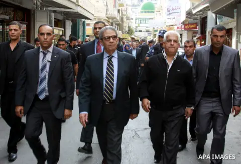 Egyptian politician and former Arab League secretary general, Amr Moussa walks around in the old town market in the west bank city of Nablus on November 4, 2012. Photo by Nedal Eshtayah