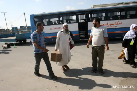 Palestinian pilgrims arrive the Rafah border crossing into Gaza Strip, in the southern Gaza strip town of Rafah on Nov. 07, 2012 . Hundreds of Palestinian pilgrims will cross into Gaza Strip on their way from Saudi Arabi...