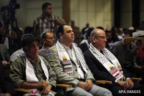 Members of the Egyptian Cinematic Syndicate attend the ceremony of the first show of the Palestinian-Egyptian Film "Lover of Rifle" in Gaza on November 8, 2012. Lover of Rifle is the first joint movie between Palestinian...