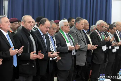 Palestinian President Mahmud Abbas attends a ceremony marking the eighth anniversary of the death of the late leader Yasser Arafat, in the West Bank city of Ramallah on November 11, 2012. Palestinians are coordinating wi...