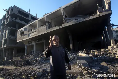 Palestinians check their damaged house after Israeli air strikes in Gaza City November 15, 2012. Israel exchanged the fiercest fire with Hamas in years after assassinating its military mastermind and threatening a wider...