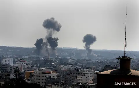 Smoke rises after an Israeli air strike in Gaza city Nov. 15, 2012. The Israeli air force continued striking Hamas targets in the Gaza Strip on Wednesday, after killing 10 people, including al-Jaabari and at least five c...
