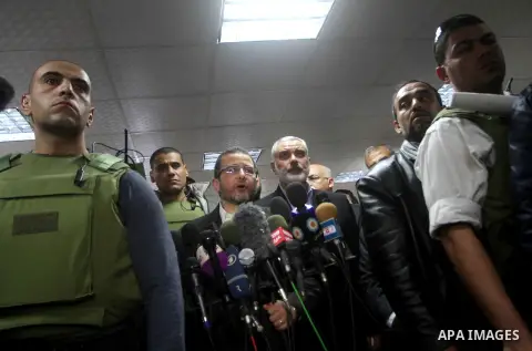 Egyptian Prime Minister Hisham Qandil speaks during a press conference with Palestinian Prime Minister in the Gaza Strip Ismail Haniya in Gaza City, on November 16, 2012 . Egyptian premier Hisham Qandil vowed to intensif...