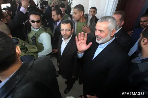 Palestinian Prime Minister in the Gaza Strip Ismail Haniya receives Egyptian Prime Minister Hisham Qandil in Gaza City, on November 16, 2012 . Egyptian premier Hisham Qandil vowed to intensify Cairo's efforts to secure a...