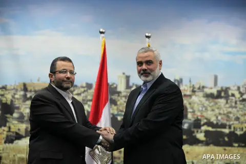 Palestinian Prime Minister in the Gaza Strip Ismail Haniya receives Egyptian Prime Minister Hisham Qandil in Gaza City, on November 16, 2012 . Egyptian premier Hisham Qandil vowed to intensify Cairo's efforts to secure a...