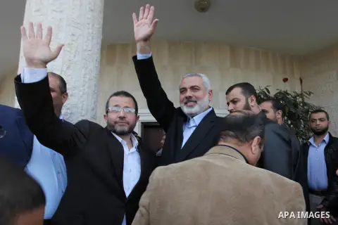 Palestinian Prime Minister in the Gaza Strip Ismail Haniya receives Egyptian Prime Minister Hisham Qandil in Gaza City, on November 16, 2012 . Egyptian premier Hisham Qandil vowed to intensify Cairo's efforts to secure a...