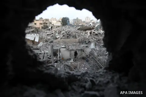 Palestinians inspect the damage at Prime Minister in Gaza Ismail Haniyeh's office after being destroyed during an overnight Israeli airstrike in Gaza City, Saturday, Nov. 17, 2012. Israel bombarded the Hamas-ruled Gaza S...
