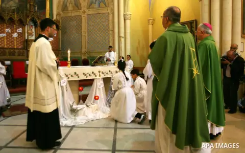 Bishop William Shomali lead a Mass to pray for the children of Gaza, in the Church of the Annunciation in the West Bank city of Beit Jala, on November 18, 2012. Israeli aircraft killed five Palestinian children in on Sun...