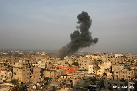 Smoke rises after an Israeli airstrike in Rafah in southern Gaza strip, 19 November, 2012. Media reports that Israeli forces were on Monday targeting the Palestinian homes and other buildings in its bombardment of the Ga...