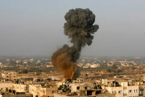 Smoke rises after an Israeli airstrike in Rafah in southern Gaza strip, 19 November, 2012. Media reports that Israeli forces were on Monday targeting the Palestinian homes and other buildings in its bombardment of the Ga...