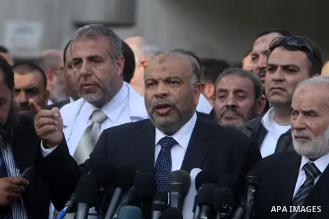 The leader of Egypt's Islamist Freedom and Justice Party Saad al-Katatni speaks to media during his visit to Gaza strip, in Gaza city, Nov. 19, 2012. APAimages \ Yasser Qudih, POOL