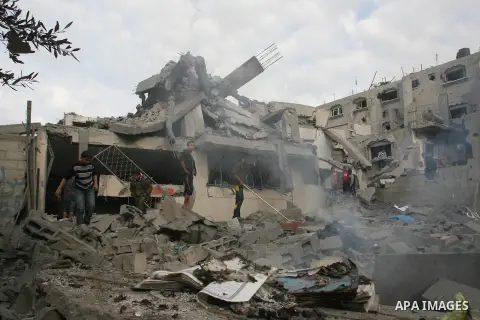 Palestinians inspect damaged tunnel following Israeli air strikes on the southern Gaza Strip town of Rafah on November 20, 2012. The Israeli military said it attacked about 100 targets in the coastal strip during the nig...