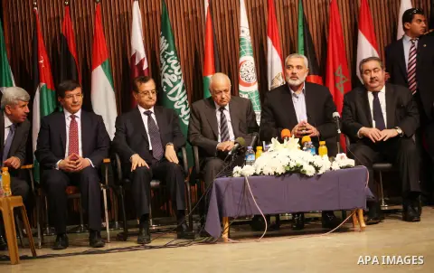 Arab League General Secretary Nabil al-Arabi and Turkish Foreign Minister Ahmet Davutoglu meet with Palestinian prime minister in Gaza Strip, Ismail Haniya in Gaza city, Tuesday, Nov. 20, 2012. Turkey's foreign minister...