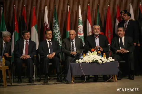 Arab League General Secretary Nabil al-Arabi and Turkish Foreign Minister Ahmet Davutoglu meet with Palestinian prime minister in Gaza Strip, Ismail Haniya in Gaza city, Tuesday, Nov. 20, 2012. Turkey's foreign minister...