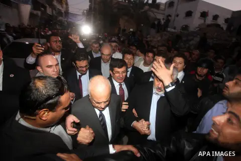 Arab League General Secretary Nabil al-Arabi and Turkish Foreign Minister Ahmet Davutoglu meet with Palestinian prime minister in Gaza Strip, Ismail Haniya in Gaza city, Tuesday, Nov. 20, 2012. Turkey's foreign minister...