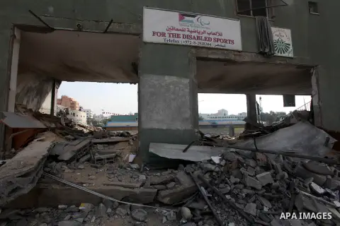 A destroyed gridiron seen after an israeli air strike in Gaza City, 21 November 2012. Palestinian militants renewed their rocket fire on Israel 21 November and Israel continued pounding targets in the Gaza Strip, as agre...