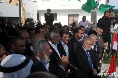 Palestinian prime minister in Gaza Ismail Haniyeh and Islamic Jihad leader Mohammed Al-Hindi, senior Fatah official Nabil Shaath and deputy speaker of Palestinian Parliament Ahmed Bahar celebrate what Palestinians say is...