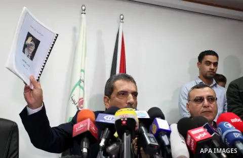 Tawfiq Tirawi, the head of the Palestinian inquiry team into the death of the late Palestinian leader Yasser Arafat, speaks to reporters during a press conference in the West Bank city of Ramallah, on November 24, 2012....