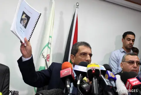 Tawfiq Tirawi, the head of the Palestinian inquiry team into the death of the late Palestinian leader Yasser Arafat, speaks to reporters during a press conference in the West Bank city of Ramallah, on November 24, 2012....
