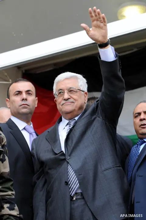 Palestinian President Mahmoud Abbas gestures as he speaks during a rally supporting the Palestinian UN bid for observer state status, in the West Bank city of Ramallah, Sunday, Nov. 25, 2012. The Palestinians will reques...