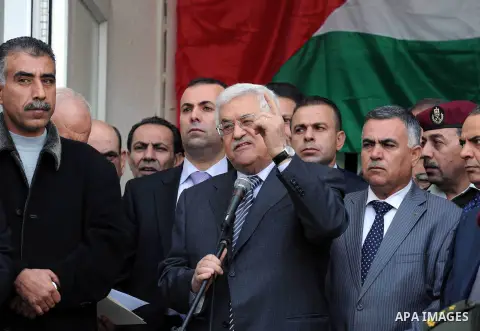 Palestinian President Mahmoud Abbas gestures as he speaks during a rally supporting the Palestinian UN bid for observer state status, in the West Bank city of Ramallah, Sunday, Nov. 25, 2012. The Palestinians will reques...