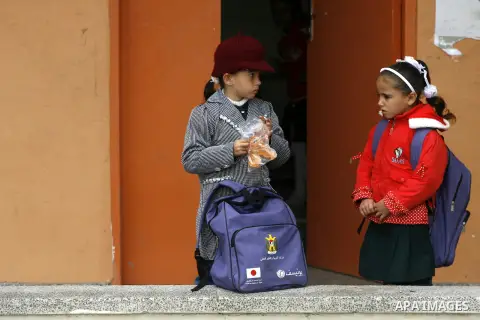 Palestinian students stand in a school in Rafah southern Gaza City, 25 November 2012. Normal life in Gaza resumed remarkably fast after a ceasefire agreement was announced following eight days of cross border violence be...