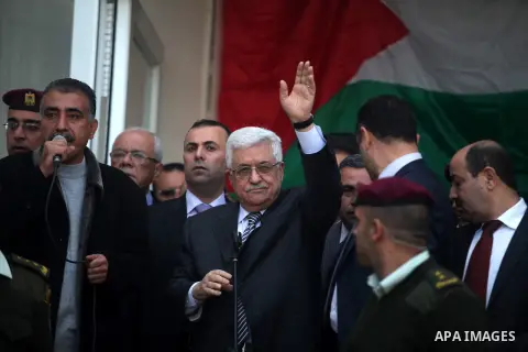 Palestinian President Mahmoud Abbas gestures as he speaks during a rally supporting the Palestinian UN bid for observer state status, in the West Bank city of Ramallah, Sunday, Nov. 25, 2012. The Palestinians will reques...