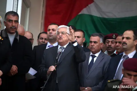 Palestinian President Mahmoud Abbas gestures as he speaks during a rally supporting the Palestinian UN bid for observer state status, in the West Bank city of Ramallah, Sunday, Nov. 25, 2012. The Palestinians will reques...