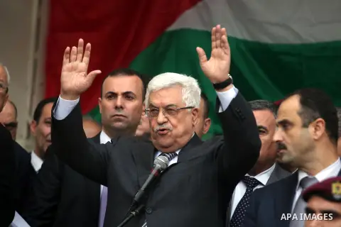Palestinian President Mahmoud Abbas gestures as he speaks during a rally supporting the Palestinian UN bid for observer state status, in the West Bank city of Ramallah, Sunday, Nov. 25, 2012. The Palestinians will reques...