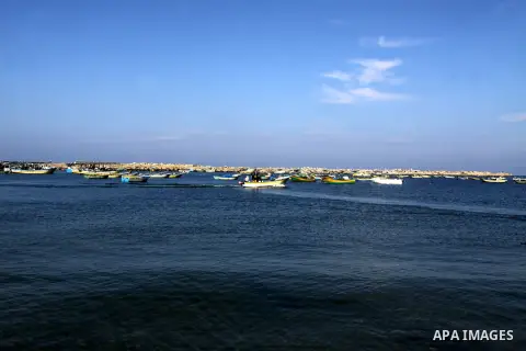 Palestinian fishermen prepare their boats in the port of Gaza on the Mediterranean coast, on Nov. 26, 2012, as a fragile truce between Israel and militant groups in Gaza enters its third day. Israel slammed Palestinian p...