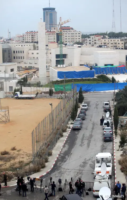 A general view of the mausoleum of the later Palestinian leader Yasser Arafat, protected by blue tarpaulin on November 27, 2012, at the Muqataa in the West Bank city of Ramallah. The remains of iconic Palestinian leader...