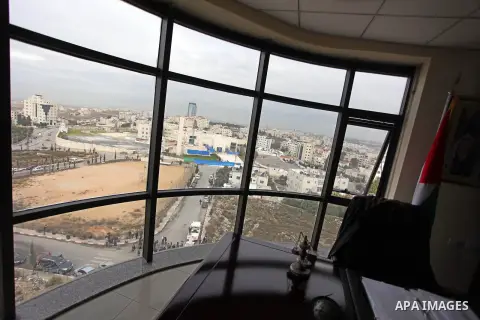 A general view of the mausoleum of the later Palestinian leader Yasser Arafat, protected by blue tarpaulin on November 27, 2012, at the Muqataa in the West Bank city of Ramallah. The remains of iconic Palestinian leader...