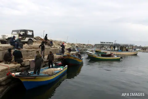 Palestinian fishermen prepare their boats in the port of Gaza on the Mediterranean coast, on November 27, 2012. Israel eased restrictions on Gaza fishermen on Saturday, further implementing truce brokered by Egypt after...