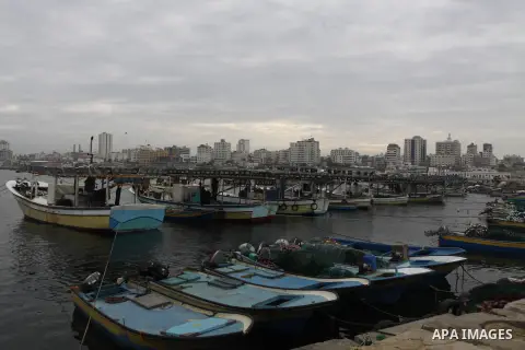 Palestinian fishermen prepare their boats in the port of Gaza on the Mediterranean coast, on November 27, 2012. Israel eased restrictions on Gaza fishermen on Saturday, further implementing truce brokered by Egypt after...