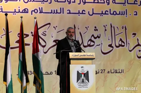 Palestinian Prime Minister in Gaza strip Ismail Haniyeh speaks during a ceremony to honor the families of martyrs in Gaza city on November 27, 2012. Israeli aircraft killed 166 including scores of civilians , and injured...