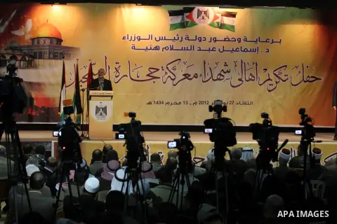 Palestinian Prime Minister in Gaza strip Ismail Haniyeh speaks during a ceremony to honor the families of martyrs in Gaza city on November 27, 2012. Israeli aircraft killed 166 including scores of civilians , and injured...