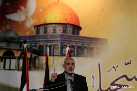 Palestinian Prime Minister in Gaza strip Ismail Haniyeh speaks during a ceremony to honor the families of martyrs in Gaza city on November 27, 2012. Israeli aircraft killed 166 including scores of civilians , and injured...
